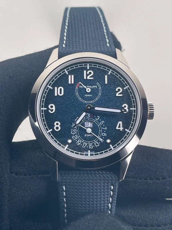 Patek Philippe 8-DAY POWER RESERVE. INSTANTANEOUS DAY AND DATE. 5328G-001 5