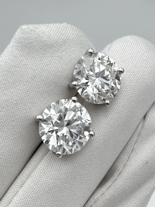 No name ROUND DIAMONDS 5.06 - 5.01 CT G/VVS-VS EXEXEX (GIA) NN5.06-5.01 5