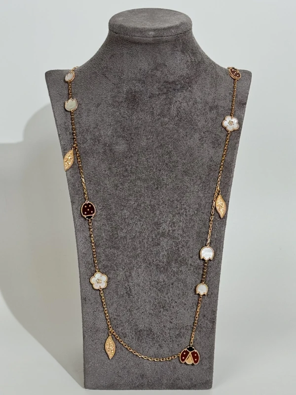 Van Cleef & Arpels. Lucky Spring long necklace, 15 motifs VCARP7RT00 3