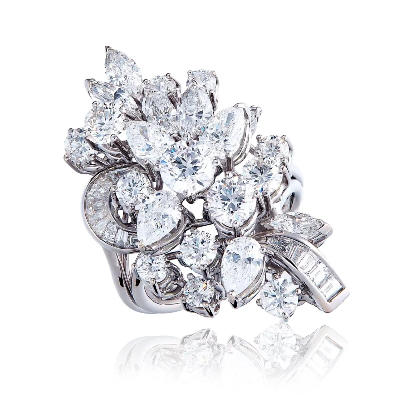 PEAR AND ROUND DIAMOND RING