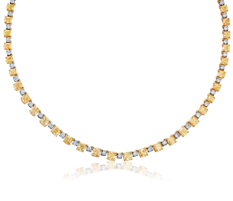 FANCY VERY LIGHT YELLOW DIAMOND NECKLACE 23.55 CT