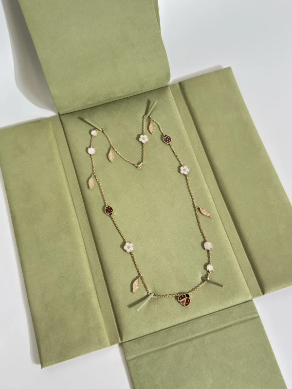 Van Cleef & Arpels. Lucky Spring long necklace, 15 motifs VCARP7RT00 6