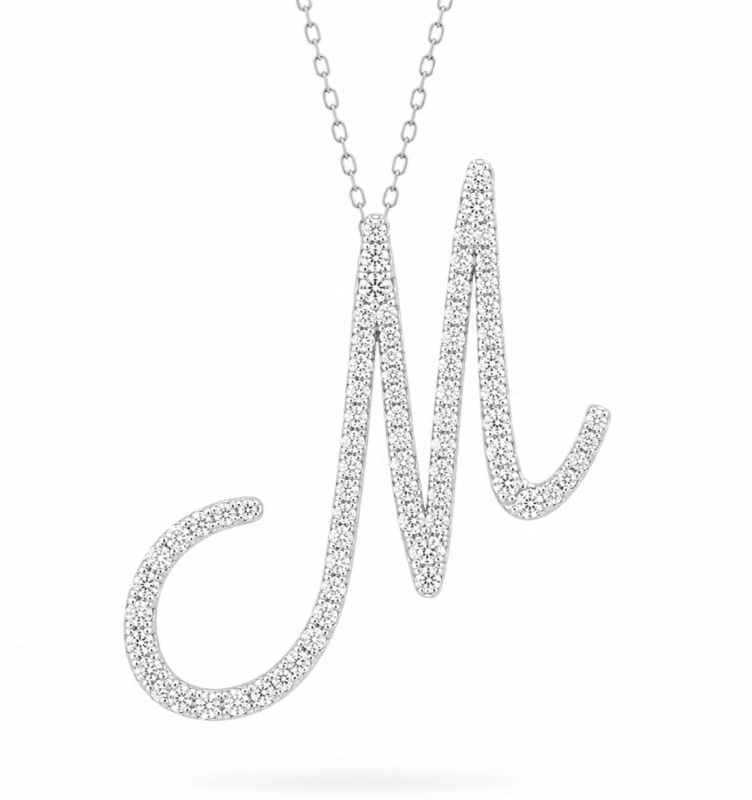 THE PENDANT LETTER "M" 0.96CT G-H/VS