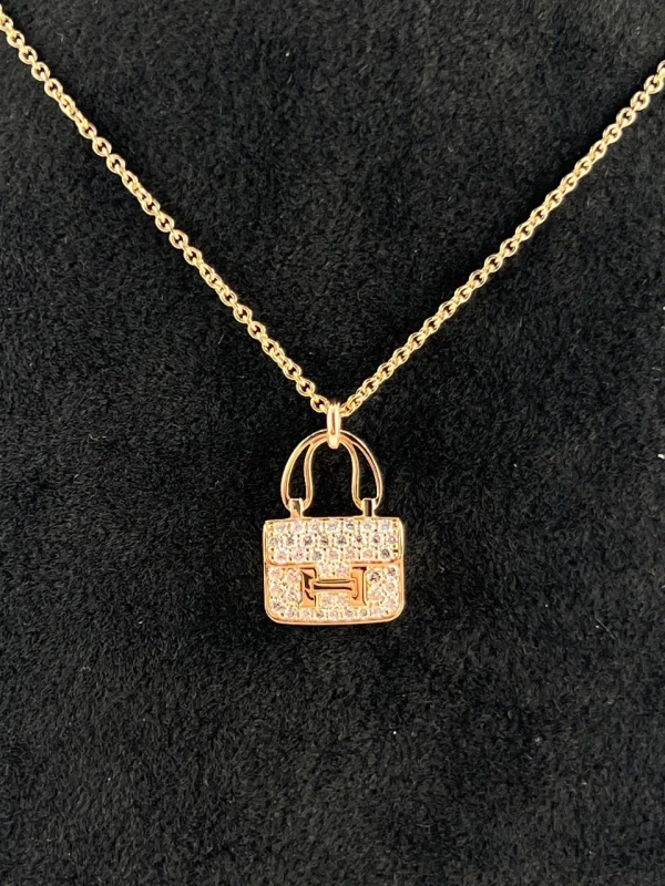 HERMES CONSTANCE AMULETTE PENDANT, SMALL MODEL Hermes 2