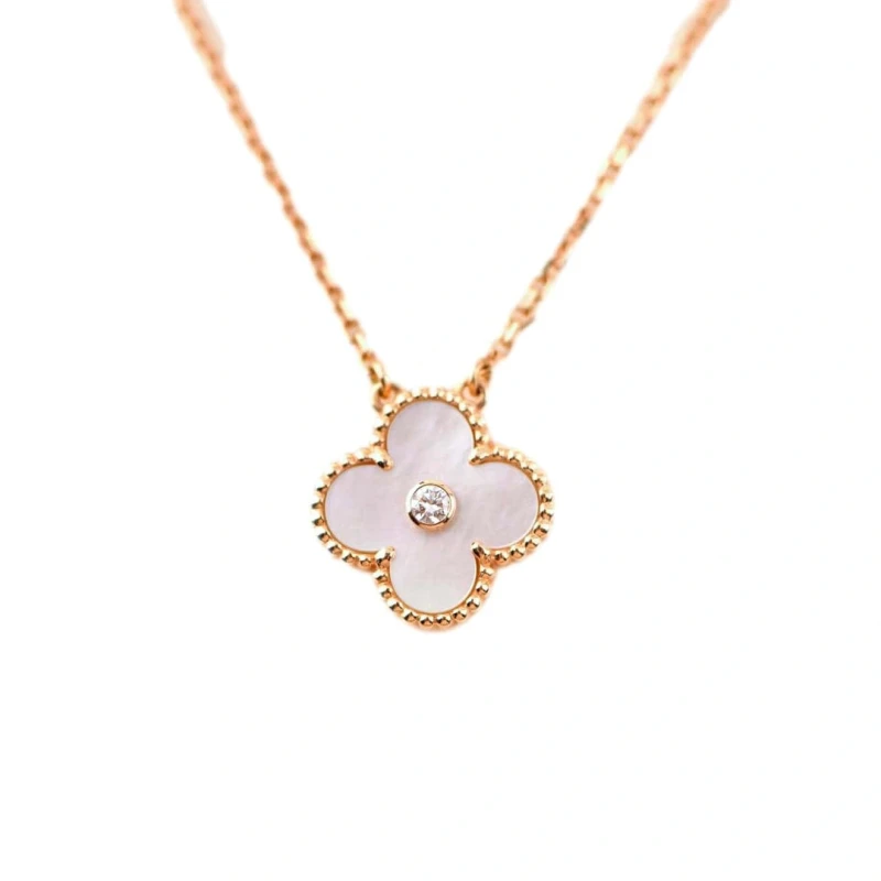 Van Cleef & Arpels. HOLIDAY 2025 VINTAGE ALHAMBRA PINK MOTHER OF PEARL PENDANT & DIAMOND VCARPMOP00 1