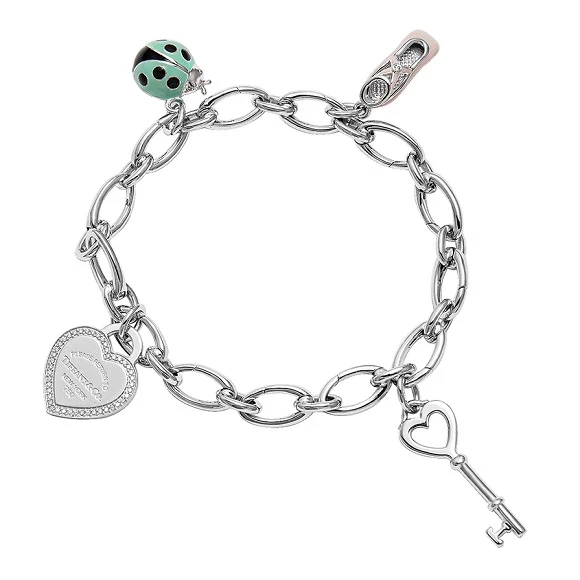 LINK CLASP WHITE GOLD BRACELET AND FOUR CHARMS