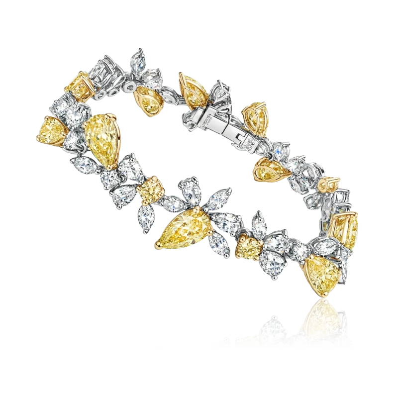 PEAR DIAMONDS 6.14 CT FANCY LIGHT YELLOW BRACELET (SIZE 17.0)