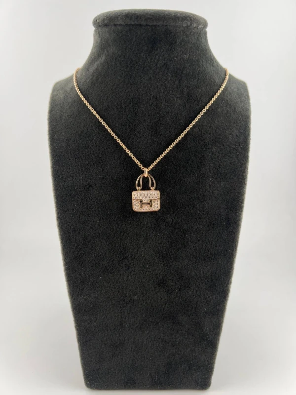 HERMES CONSTANCE AMULETTE PENDANT, SMALL MODEL Hermes 4