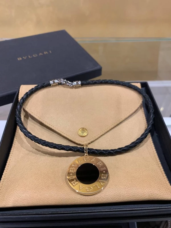 Bvlgari BVLGARI BLACK ONYX REVERSIBLE YELLOW GOLD AND STEEL PENDANT 348528 4